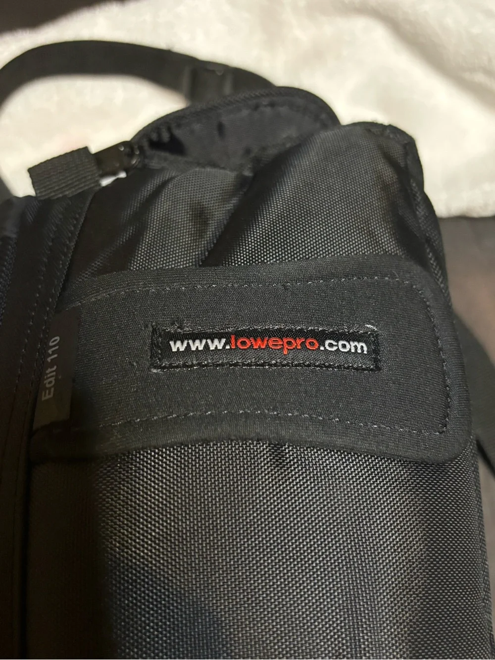 Lowepro Black Camera Shoulder Bag with Compact Holster and a free bag.